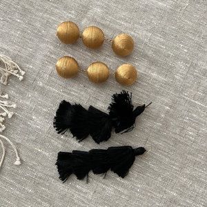 Bon Bon gold thread earrings and black silk tassel earrings.